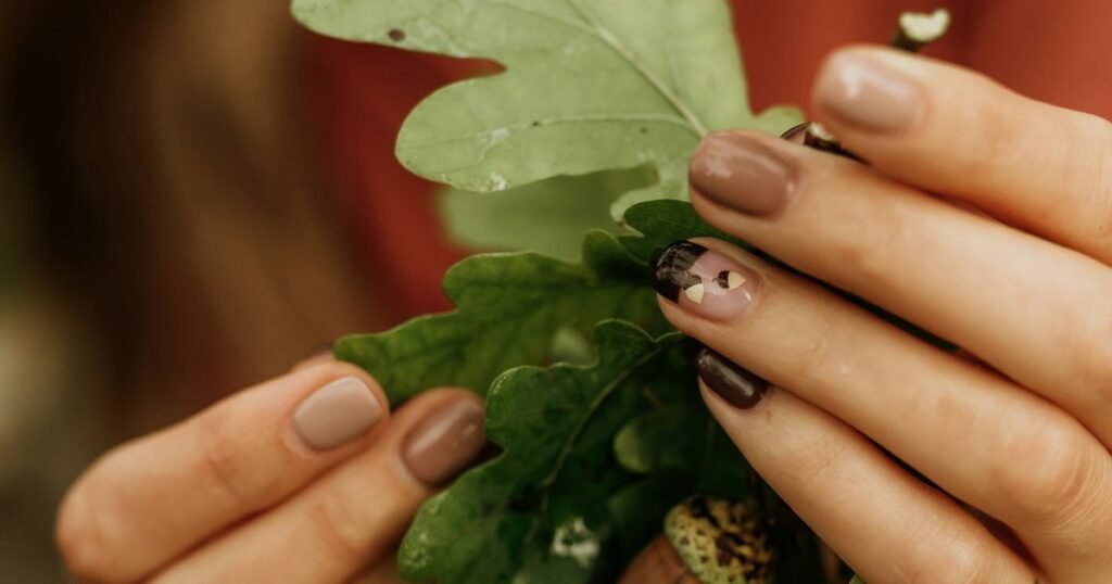 Glossy Acorn & Earthy Neutral Nails