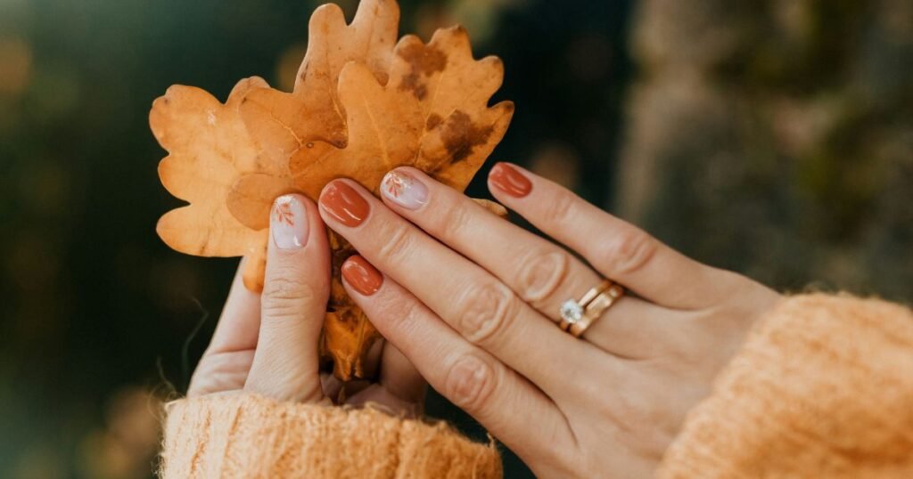 Glossy Terracotta & Glitter Leaves Nails